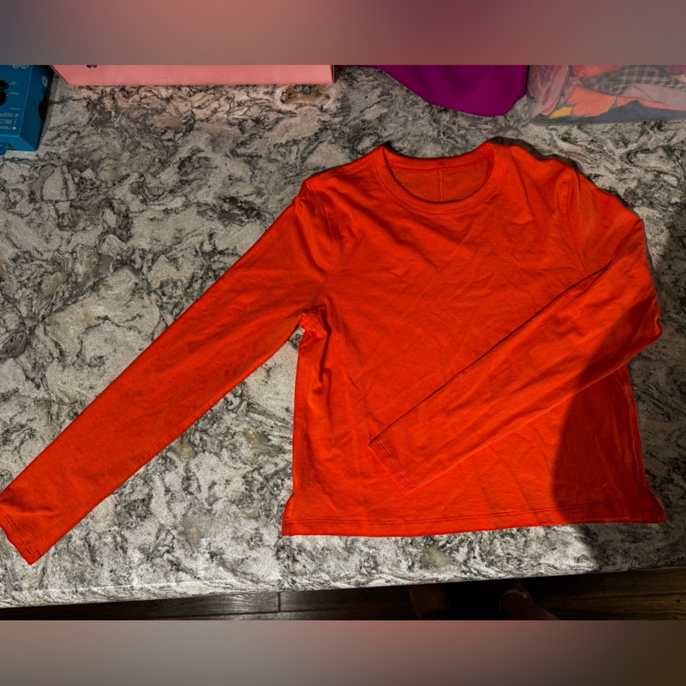 Orange lululemon cropped tshirt
